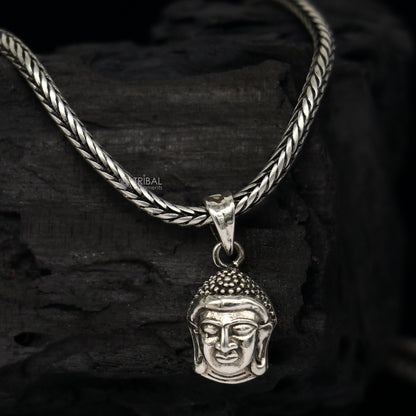 925 silver Lord Buddha face pendant by TRIBAL ORNAMENTS, featuring detailed Buddha face symbolizing inner peace and wisdom.