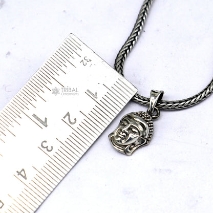 925 silver Lord Buddha face pendant by TRIBAL ORNAMENTS, showcasing intricate design symbolizing inner peace and wisdom.