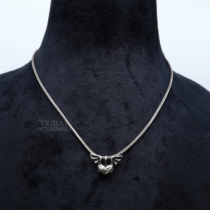 Sterling silver heart pendant with feather design, handmade unisex jewelry by Tribal Ornaments, stylish and perfect for gifting.