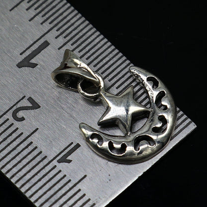 Sterling silver sun, moon, and star pendant by TRIBAL ORNAMENTS, handmade unisex jewelry with custom design and stylish locket.