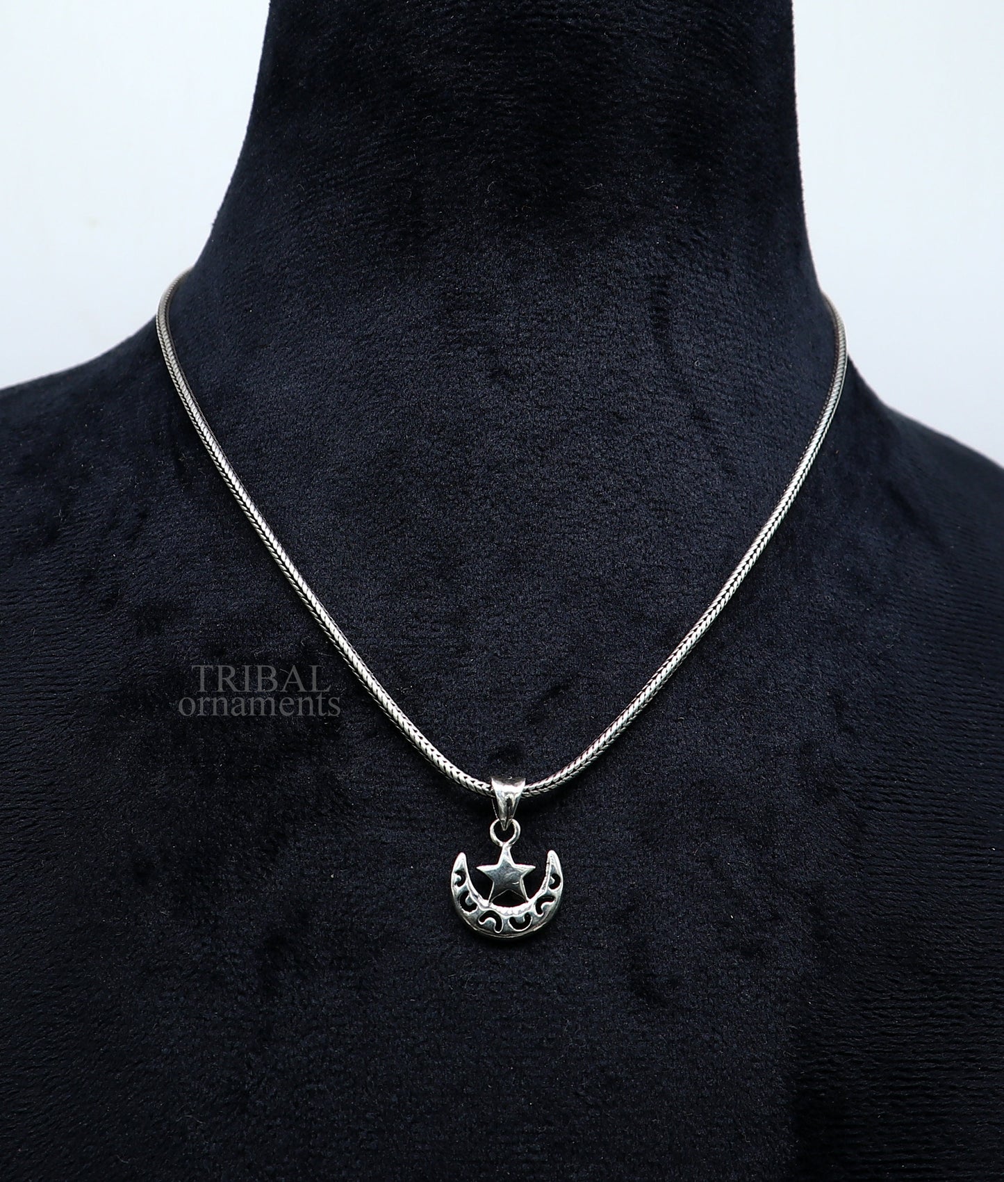 Sterling silver sun, moon, and star pendant by Tribal Ornaments featuring a handcrafted unisex design, stylish jewelry gift.