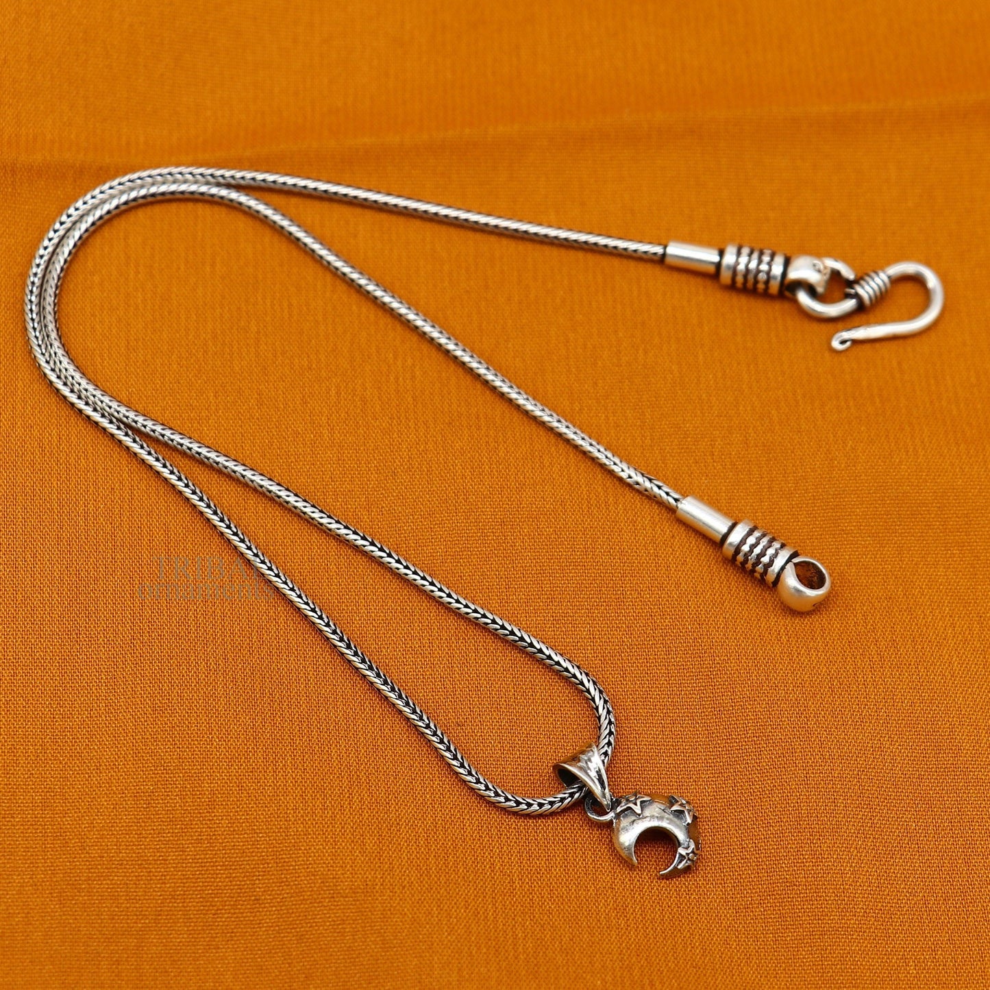 Sterling silver sun, moon, and star pendant by TRIBAL ORNAMENTS, handcrafted unisex jewelry with customized celestial design.