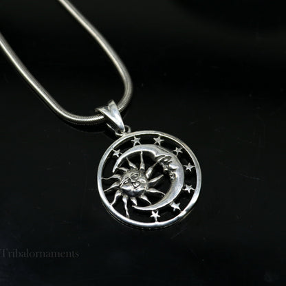 Sterling silver sun, moon, and star pendant by TRIBAL ORNAMENTS, handmade unisex jewelry with intricate celestial design.