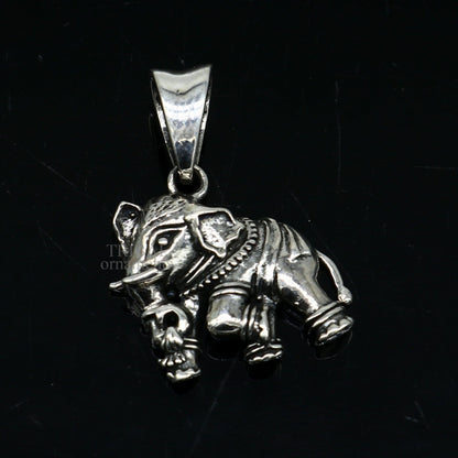 925 sterling silver elephant pendant from TRIBAL ORNAMENTS, detailed small jewelry piece, perfect for gifting or elegant necklace.
