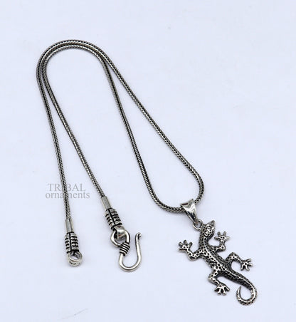 Sterling silver lizard pendant by TRIBAL ORNAMENTS featuring a detailed handmade design, perfect for gifting or jewelry collection.