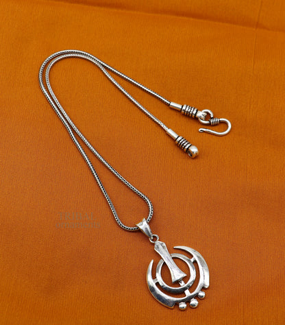 925 sterling silver Khalsa pendant featuring Waheguru symbol and Sardar logo, custom-designed Sikha pendant from Tribal Ornaments
