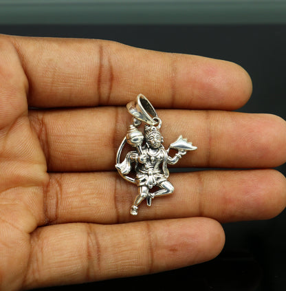 Sterling silver Lord Hanuman BajaranBali pendant by TRIBAL ORNAMENTS, vintage-style unisex jewelry with intricate design.