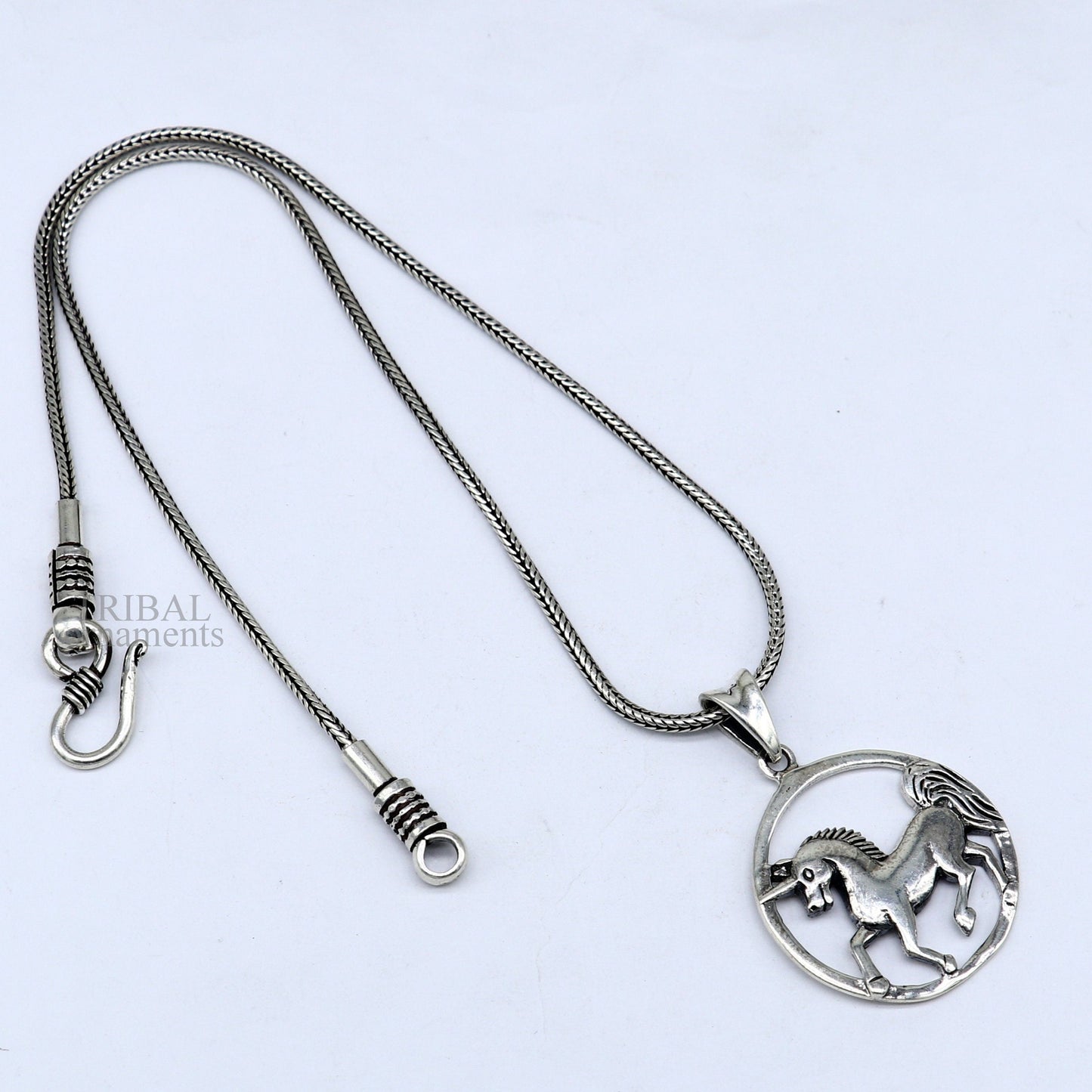 Sterling silver horse unicorn pendant by Tribal Ornaments, stylish vintage design for boys and girls, elegant jewelry accessory.
