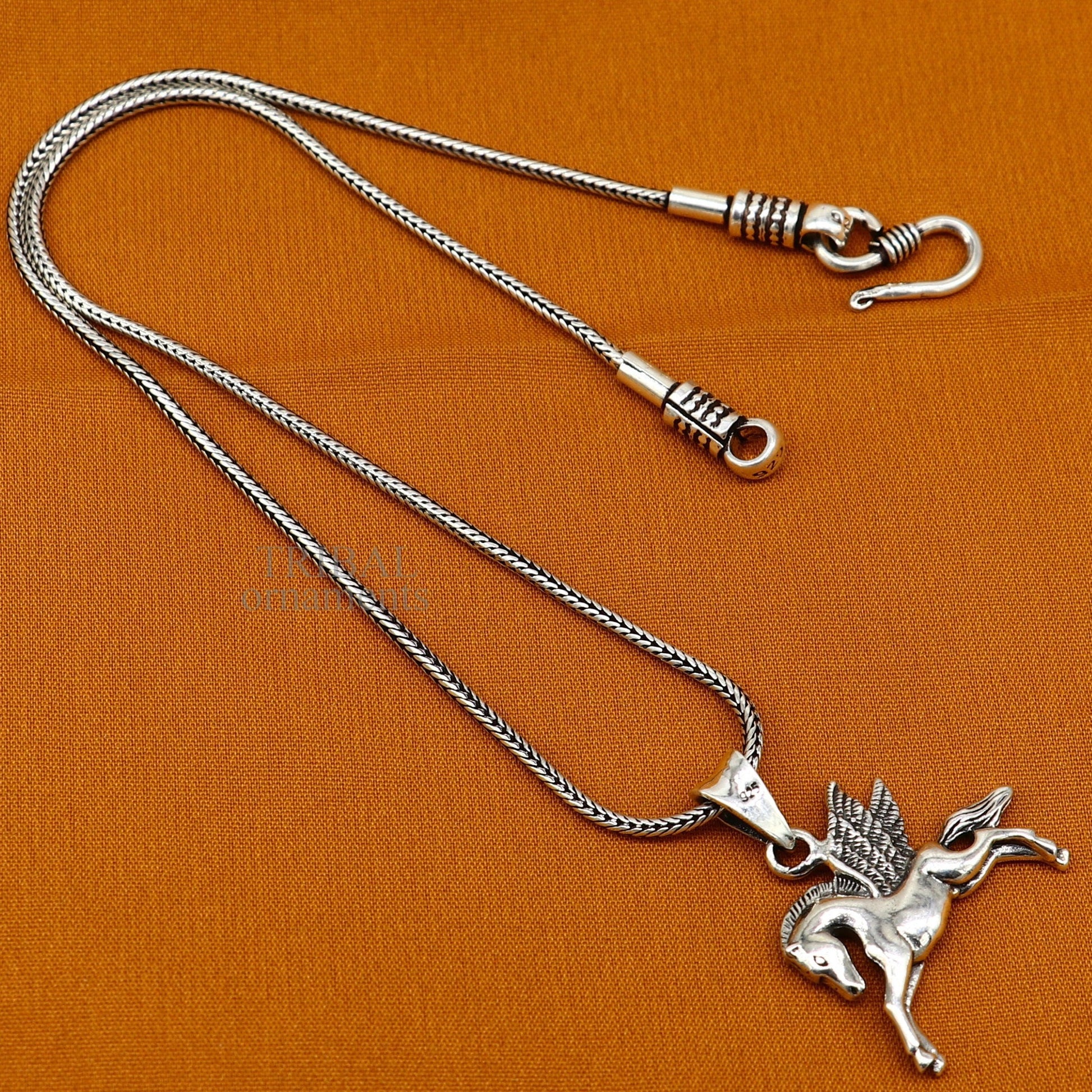 Sterling silver horse and unicorn pendant by TRIBAL ORNAMENTS, featuring an elegant vintage design for boys and girls jewelry.
