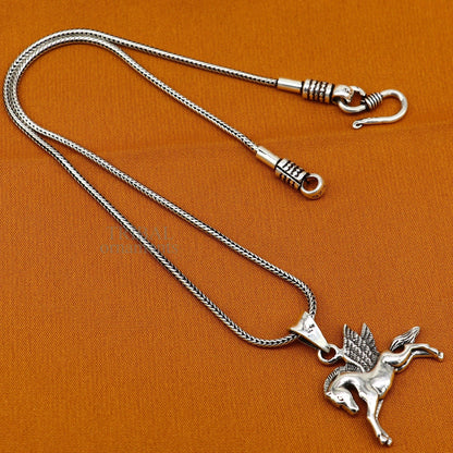 Sterling silver horse and unicorn pendant by TRIBAL ORNAMENTS, featuring an elegant vintage design for boys and girls jewelry.