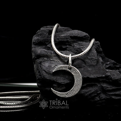 Sterling silver half moon pendant by Tribal Ornaments, delicate jewelry for men and women, showcasing intricate silver craftsmanship.