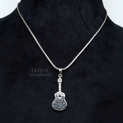 Sterling silver guitar-shaped pendant from Tribal Ornaments, unisex jewelry featuring detailed handmade tribal design.
