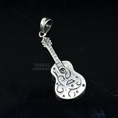 Sterling silver guitar design pendant by TRIBAL ORNAMENTS, unisex tribal jewelry, handmade, small and stylish guitar-shaped pendant.