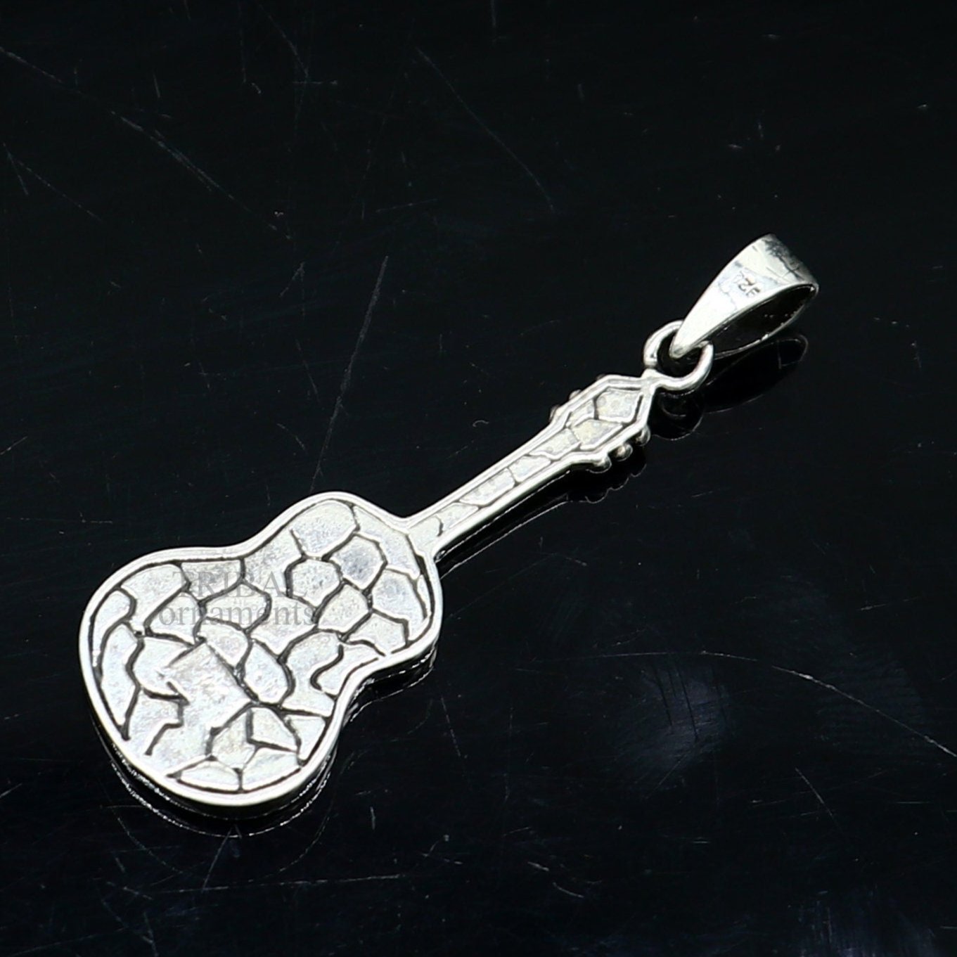 925 sterling silver guitar design pendant by TRIBAL ORNAMENTS, featuring a small handmade unisex tribal jewelry pendant.