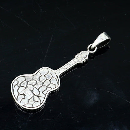 925 sterling silver guitar design pendant by TRIBAL ORNAMENTS, featuring a small handmade unisex tribal jewelry pendant.