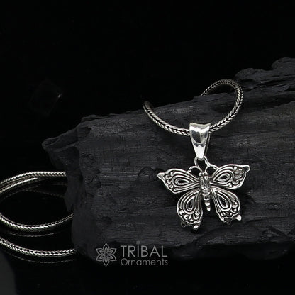 Sterling silver butterfly and bird pendant by TRIBAL ORNAMENTS, handmade unisex jewelry, delicate silver necklace accessory.