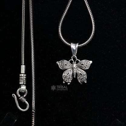 Sterling silver butterfly and bird pendant from TRIBAL ORNAMENTS, handmade unisex jewelry featuring delicate butterfly design.