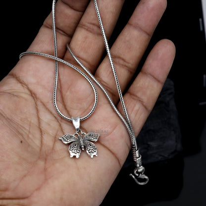 Sterling silver butterfly and bird pendant by TRIBAL ORNAMENTS, handmade unisex jewelry, delicate silver necklace accessory.