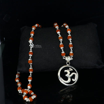 925 sterling silver OM mantra pendant with Rudraksha chain, handmade spiritual jewelry for protection from negative energy.