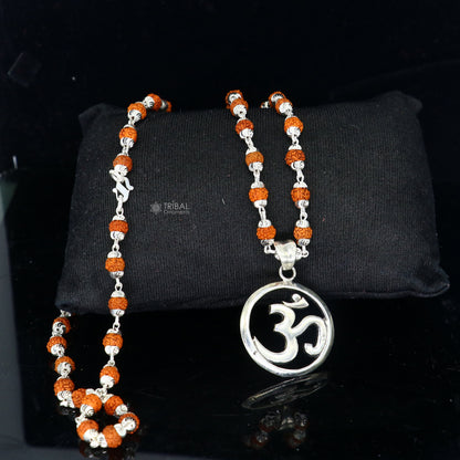 925 sterling silver OM mantra pendant with Rudraksha chain, handmade tribal jewelry for spiritual protection and positive energy.