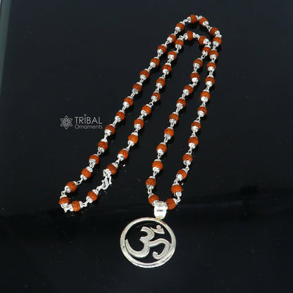 925 sterling silver Divine OM mantra pendant on Rudraksha chain, handmade spiritual jewelry for protection from negative energy.