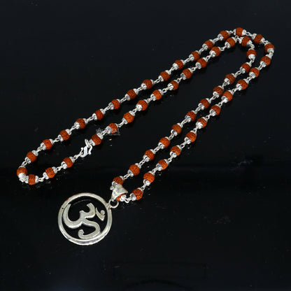 925 sterling silver Divine OM mantra pendant with Rudraksha chain, handmade jewelry for spiritual protection and positive energy.