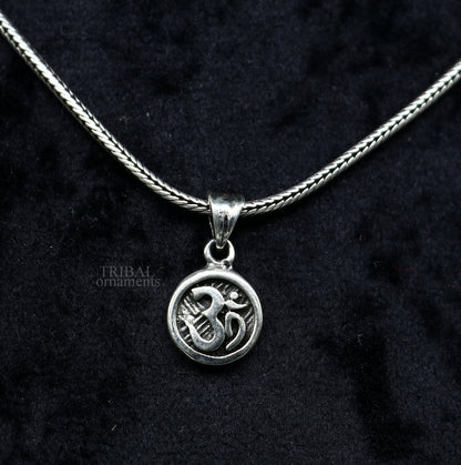 Sterling silver 'Aum' OM pendant by Tribal Ornaments, handmade tribal jewelry with divine symbols and good luck design.