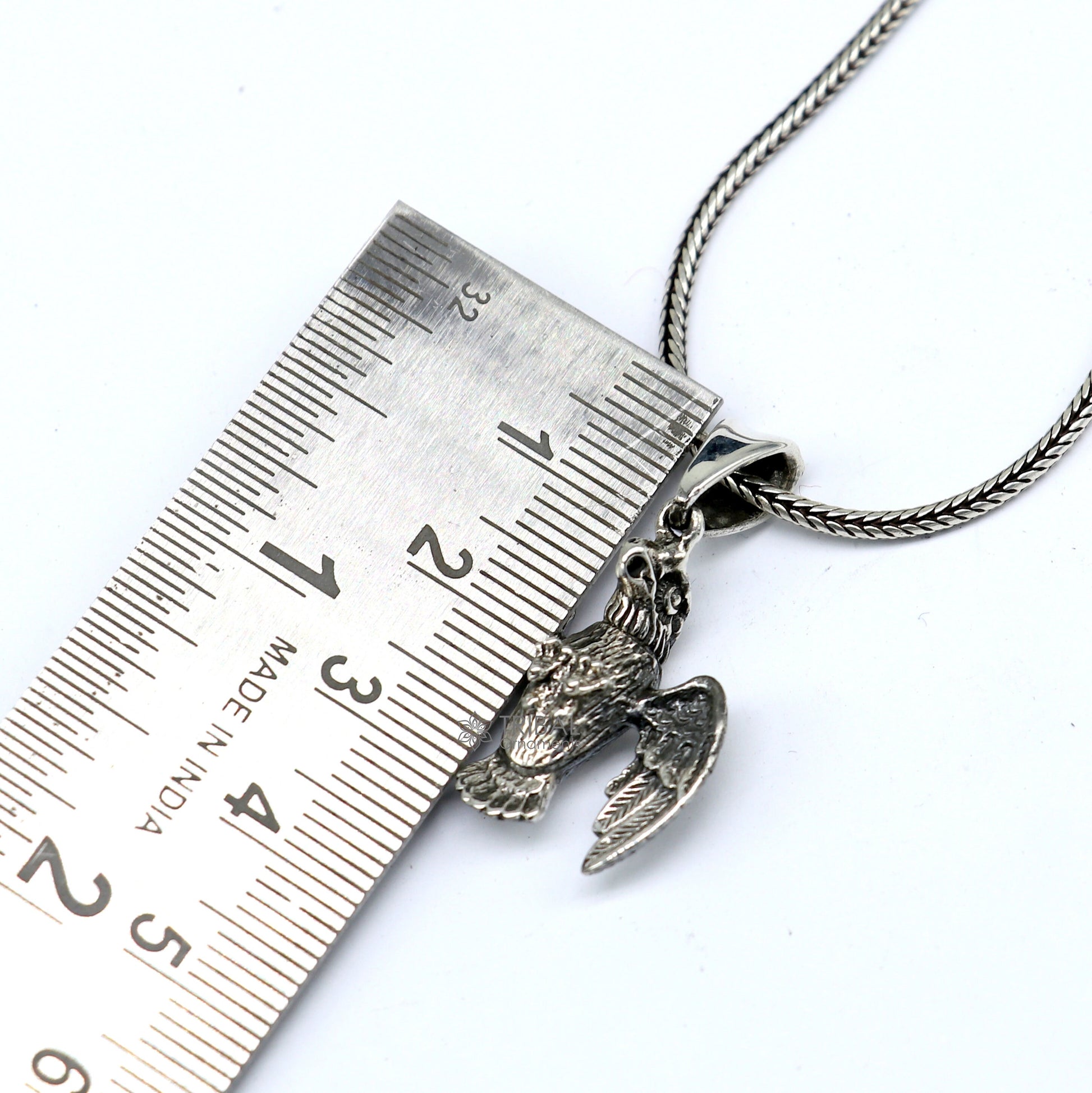 Sterling silver handmade eagle design pendant necklace featuring a Garuda motif, unisex jewelry by Tribal Ornaments.