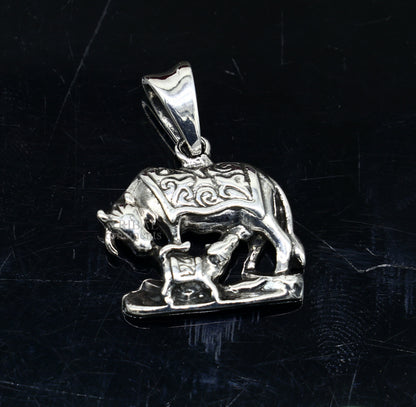925 sterling silver Kamdhenu cow with calf pendant, unisex divine jewelry, handmade tribal ornament with intricate design.
