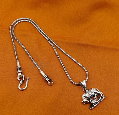 925 sterling silver divine Kamdhenu cow with calf pendant, handmade unisex jewelry from Tribal Ornaments, elegant and detailed design.