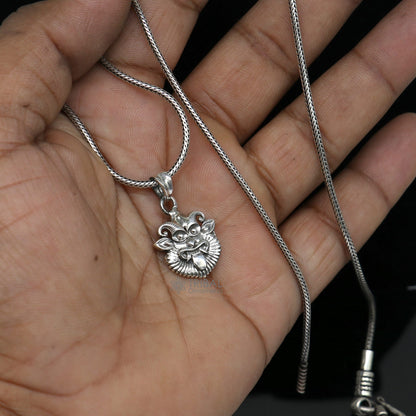 Sterling silver Evil Eyes Nazar Battu pendant by Tribal Ornaments, handcrafted protective jewelry for kids and girls.