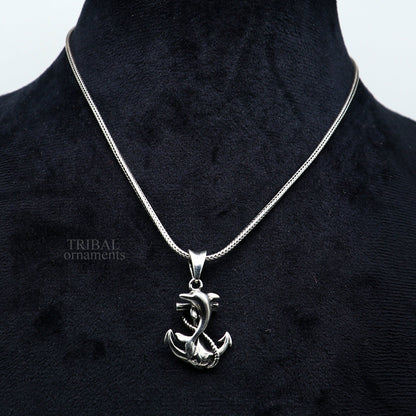 925 sterling silver dolphin with anchor pendant from Tribal Ornaments, a stylish good luck jewelry piece with intricate handcrafted details