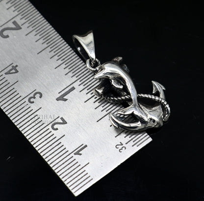 925 sterling silver dolphin with anchor pendant from TRIBAL ORNAMENTS, featuring elegant good luck jewelry design.
