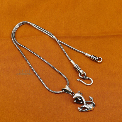 925 sterling silver dolphin and anchor pendant by Tribal Ornaments, elegant good luck jewelry with handcrafted design