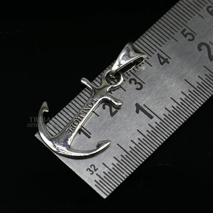 925 sterling silver Good Luck Tom Hope pendant by Tribal Ornaments, handmade jewelry with intricate tribal design.