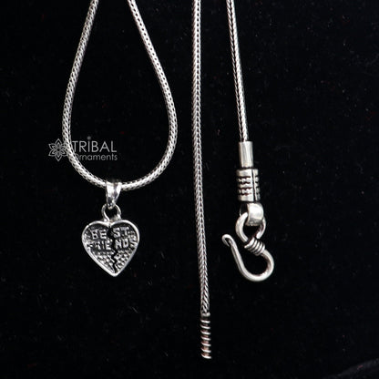 Sterling silver heart-shaped best friend pendant by Tribal Ornaments, handmade charm for boys and girls.