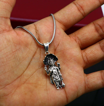 Sterling silver Vishnu pendant featuring Hindu Lord Narayanan, handmade tribal jewelry, unisex divine deity pendant.