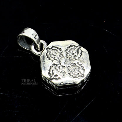 Sterling silver Hindu mantra OM pendant with intricate tribal design, personalized jewelry for good luck and spiritual blessing.