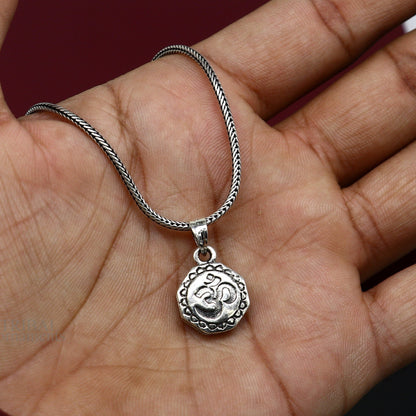 925 sterling silver Hindu mantra 'Aum' OM pendant, handmade tribal jewelry with good luck symbols and personalized design.