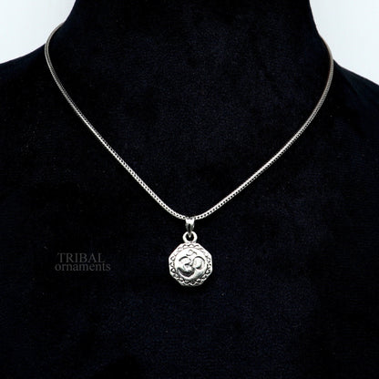 Sterling silver Hindu mantra 'Aum' OM pendant by TRIBAL ORNAMENTS, handmade tribal jewelry with good luck symbols.