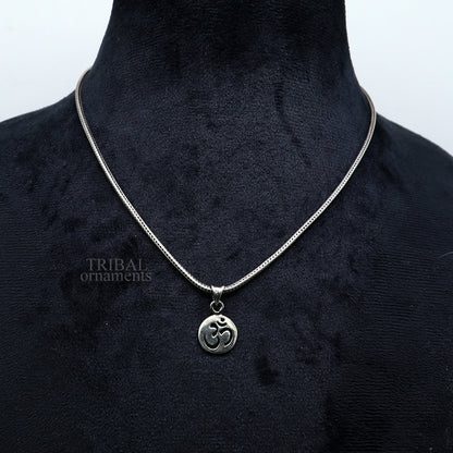 Sterling silver Hindu mantra OM pendant by TRIBAL ORNAMENTS, unisex personalized jewelry with intricate handmade tribal design.