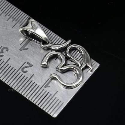 Sterling silver Aum OM pendant by Tribal Ornaments, unisex Hindu mantra jewelry with intricate tribal design.