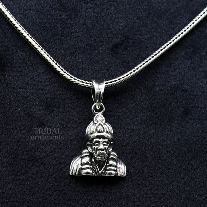 Sterling silver Sai Baba pendant by Tribal Ornaments, handcrafted unisex jewelry featuring a detailed Indian idol design.