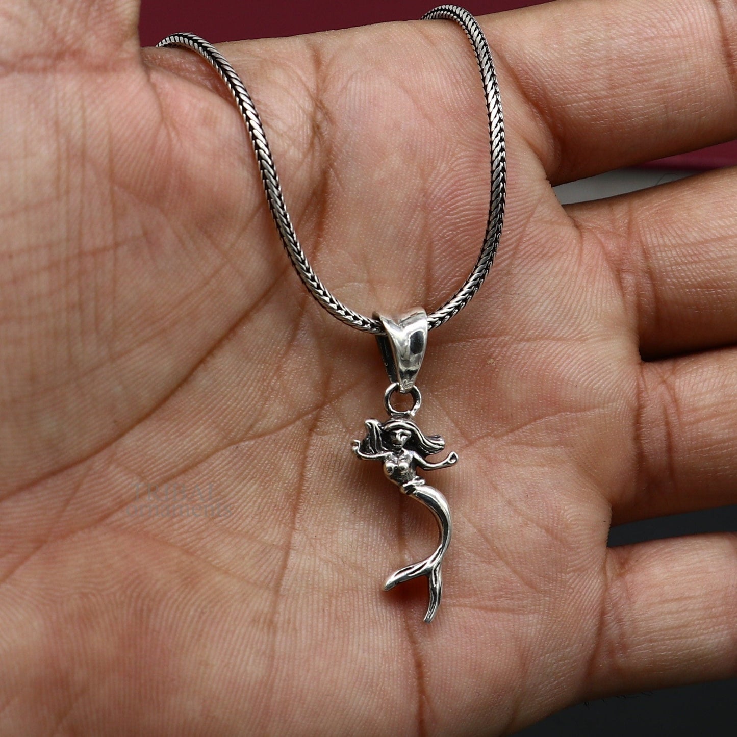 Sterling silver Jalpari mermaid pendant by Tribal Ornaments, handmade unisex jewelry with intricate mermaid design.