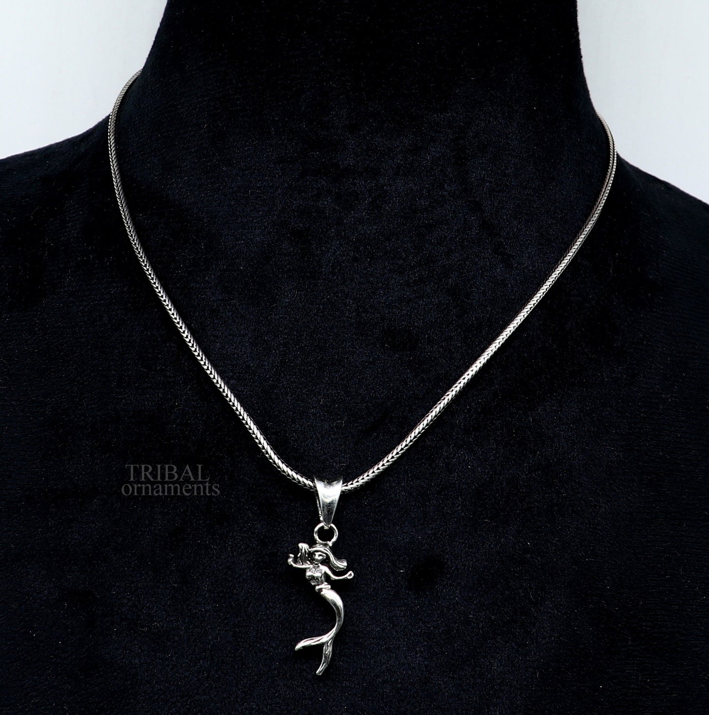 Sterling silver jalpari mermaid pendant by TRIBAL ORNAMENTS, handmade unisex jewelry with intricate mermaid design.