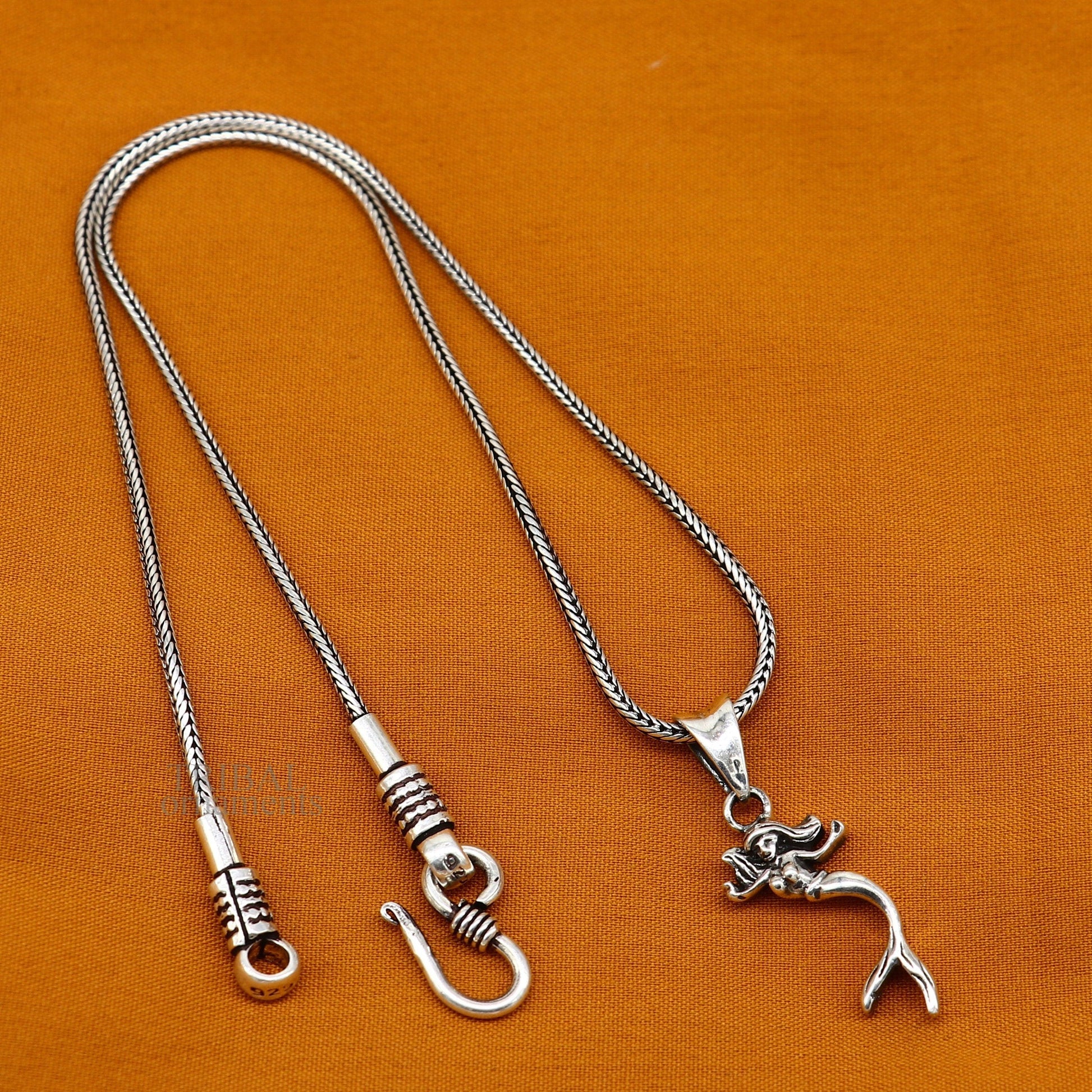925 sterling silver Jalpari mermaid pendant by TRIBAL ORNAMENTS, handmade unisex jewelry with intricate mermaid design.