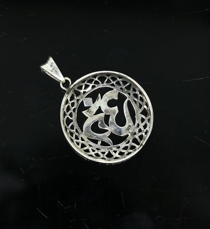 Sterling silver Aum mantra pendant by TRIBAL ORNAMENTS, unisex handmade jewelry featuring the OM symbol in a stylish design.