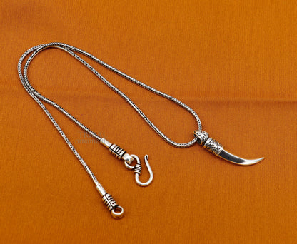 Unisex 925 sterling silver sword pendant with detailed handcrafted design, tribal-inspired jewelry by TRIBAL ORNAMENTS