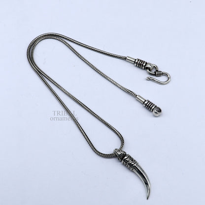 925 sterling silver sword pendant by TRIBAL ORNAMENTS, handmade unisex jewelry with detailed design and small sword shape.