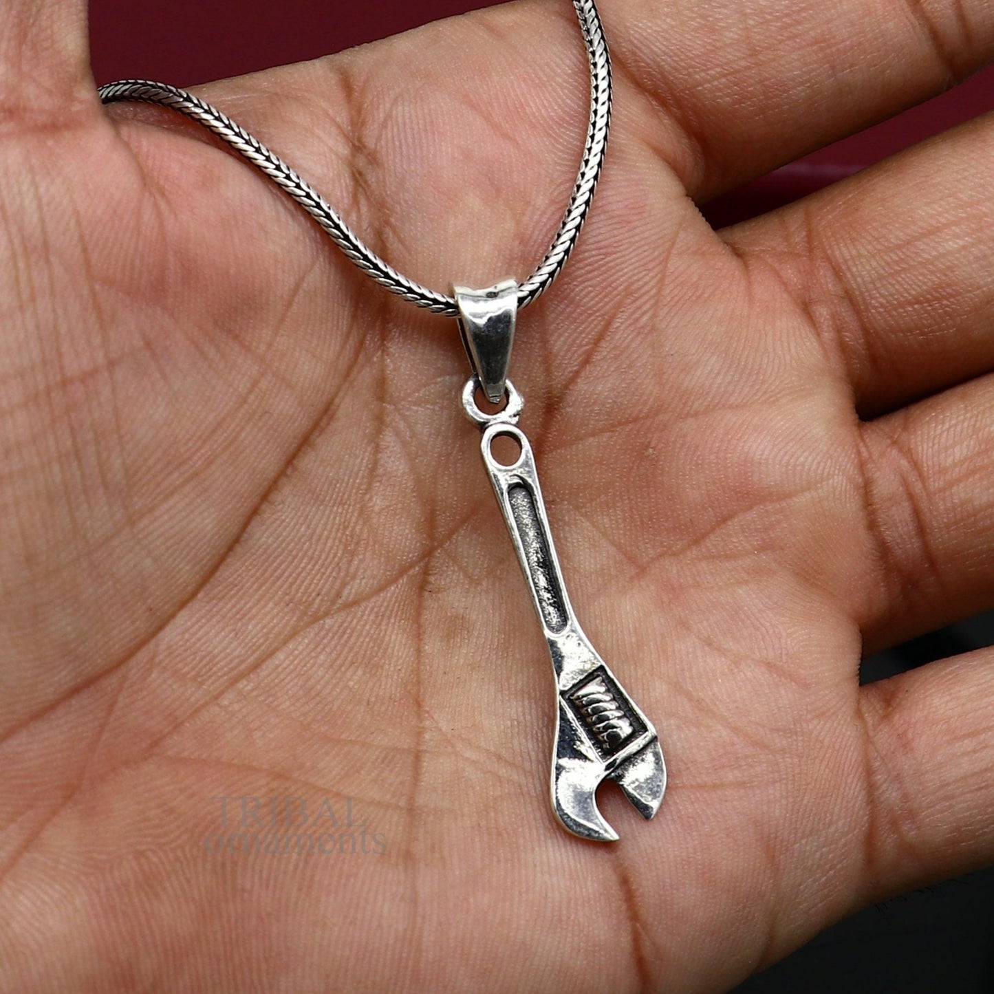 925 sterling silver small spanner pendant featuring unisex tool design, handmade tribal jewelry by TRIBAL ORNAMENTS.
